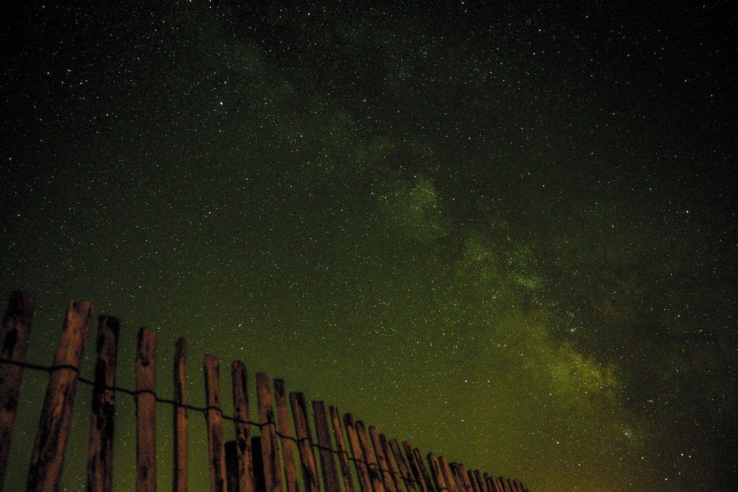 Night sky with fence.